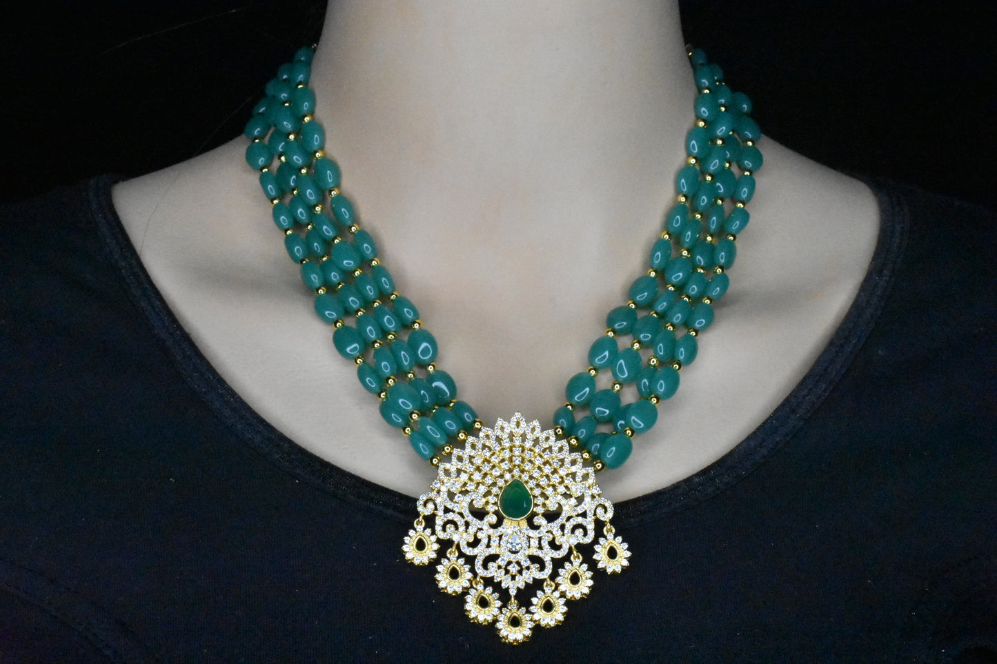 Emerald beads necklace with Cz pendant
Set