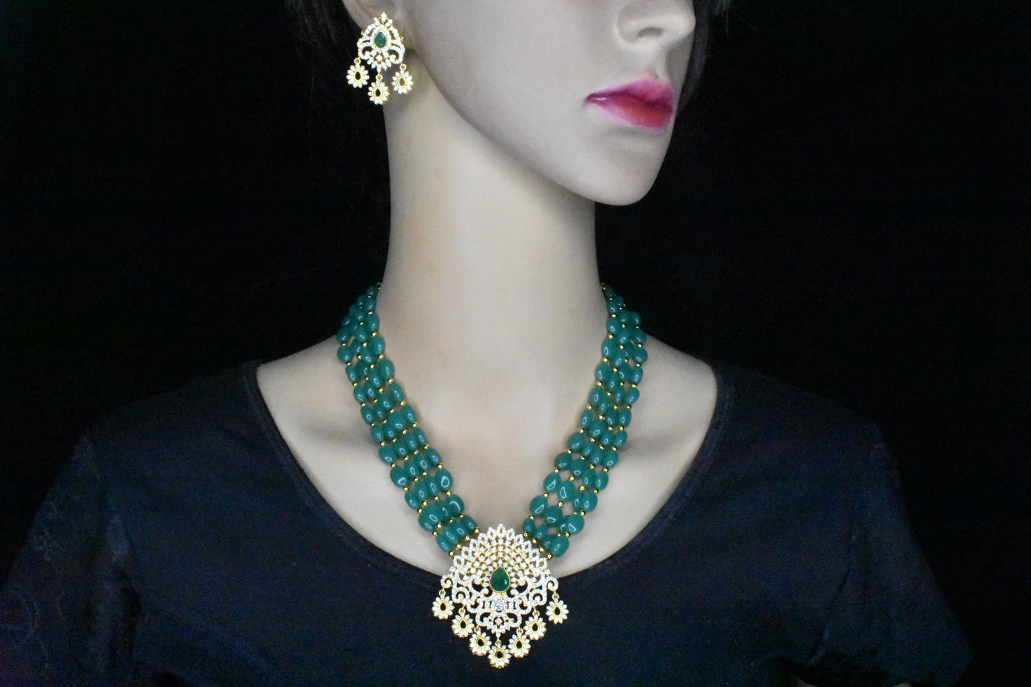 Emerald beads necklace with Cz pendant
Set